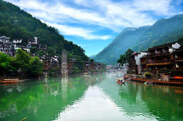 Naklejka premium HUNAN, CHINA - JUNE 16, 2014 : Old houses in Fenghuang county in Hunan, China. The ancient town of Fenghuang was added to the UNESCO World Heritage Tentative List in the Cultural category.