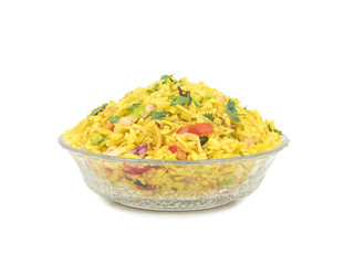 Indian Breakfast Dish Poha Also Know as Pohe or Aalu poha made up of Beaten Rice or Flattened Rice. The rice flakes are lightly fried in oil with mustard, chilly, onion, curry leaves and turmeric