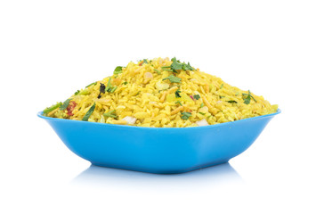 Indian Breakfast Dish Poha Also Know as Pohe or Aalu poha made up of Beaten Rice or Flattened Rice. The rice flakes are lightly fried in oil with mustard, chilly, onion, curry leaves and turmeric