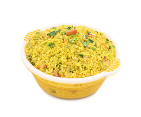 Indian Breakfast Dish Poha Also Know as Pohe or Aalu poha made up of Beaten Rice or Flattened Rice. The rice flakes are lightly fried in oil with mustard, chilly, onion, curry leaves and turmeric