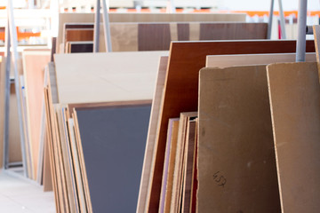 MDF, PARTICLE BOARD. Wood panels of different thicknesses and colors.
