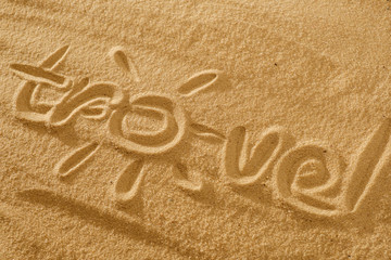 written words travel with sun sign and beam on sand of beach wave background
