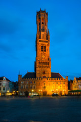 The Markt of Bruges with the view of 12th-century belfry, Belgium at dusk