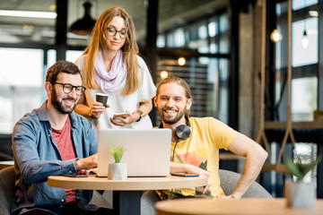 Colleagues working in the cafe