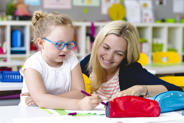 beautiful teacher helps her student to learn