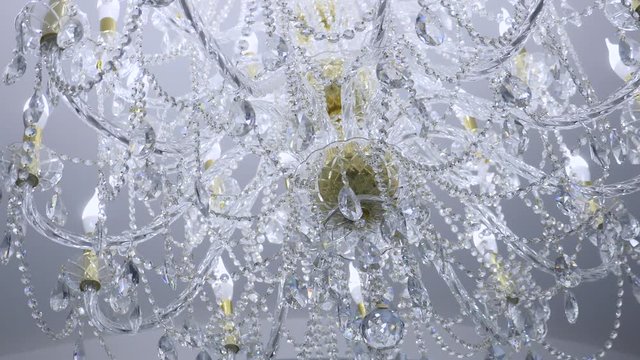 Crystal chandelier in classic room shining