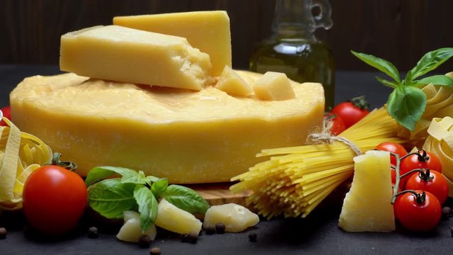Video of Traditional italian food - parmesan cheese, pasta, tomato and olive oil