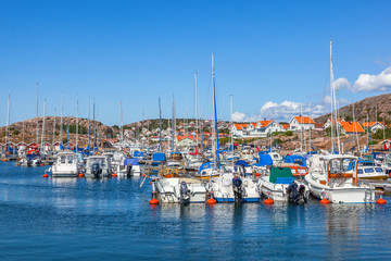 Fototapeta na wymiar View of a marina and boats in the archipelago of the Swedish west coast