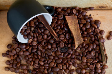 coffee beans, black Cup and cinnamon