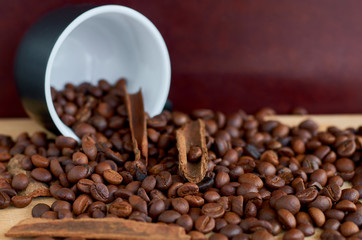 coffee beans, black Cup and cinnamon
