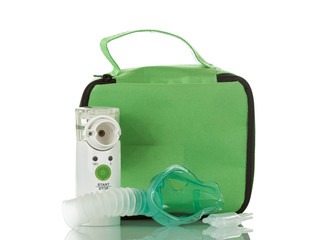 Ultrasonic mesh-nebulizer, children mask, and ampoule with medication isolated on white