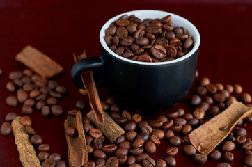 coffee beans, black Cup and cinnamon