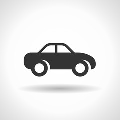 Monochromatic car icon with hovering effect shadow on grey gradient background. EPS 10