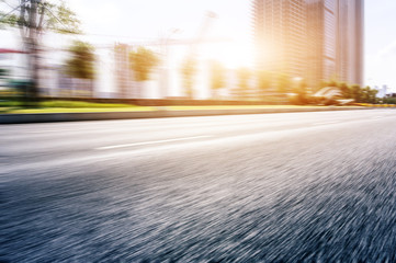 empty road with panoramic city skyline