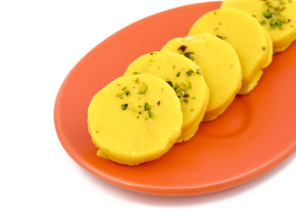 Indian Sweet Food Kesar Peda Also Know as Kesar Mawa Peda, Saffron Sweet, Saffron Peda is a saffron flavoured soft, dense sweet that is specially made during festivals