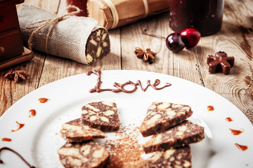 chocolate sausage on a wooden table