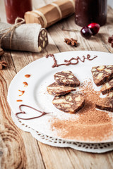 chocolate sausage on a wooden table