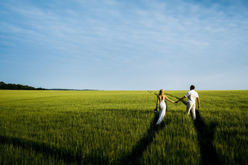 Wedding couple in field