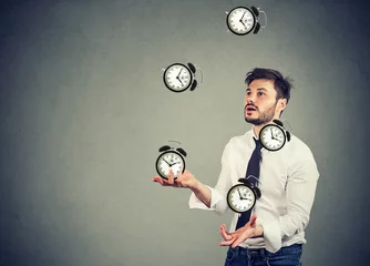 Deurstickers business man juggling his time alarm clocks © pathdoc
