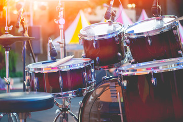 Drum set on stage, the show's musicians