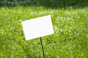 Sign on grass