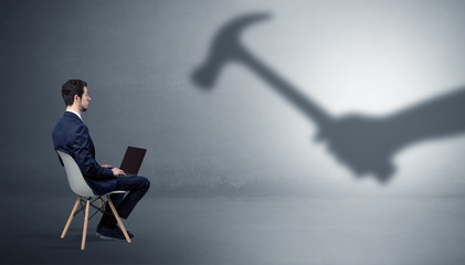 Small businessman staying and offering stuffs for an armed shadow hand
