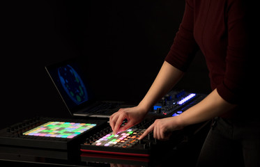 Fototapeta premium Dj hand remixing music on midi controller 