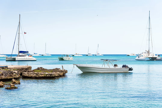 The boats near the shore in Bayahibe, La Altagracia, Dominican Republic. Copy space for text.
