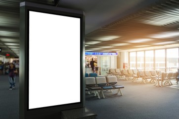 mock up of vertical blank advertising billboard or light box showcase with waiting zone at airport, copy space for your text message or media content, advertisement, commercial and marketing concept