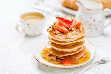 Tasty Homemade pancakes with strawberries. Traditional Breakfast