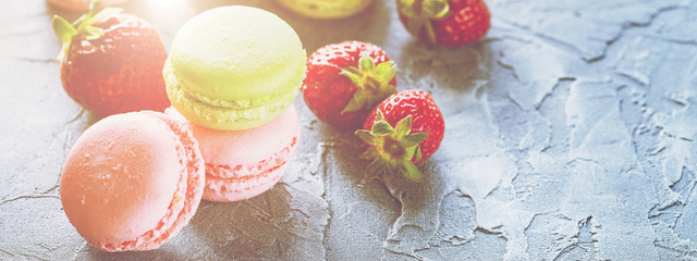 Pink Macaroons with strawberries. Banner Concept