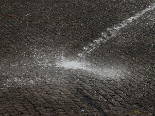 Wet cleaning of street.