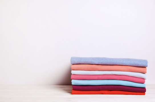 Stack Of Neatly Folded Colorful Kitchen Towels, On White Background. Stock  Photo, Picture and Royalty Free Image. Image 91284583.