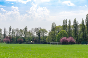An empty park and playing field in spring. Chibrook Meadows at Grove Park in London