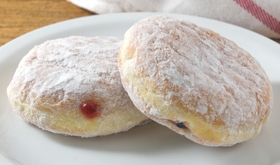 Plate of Fresh Donut Filled with Strawberry Jam