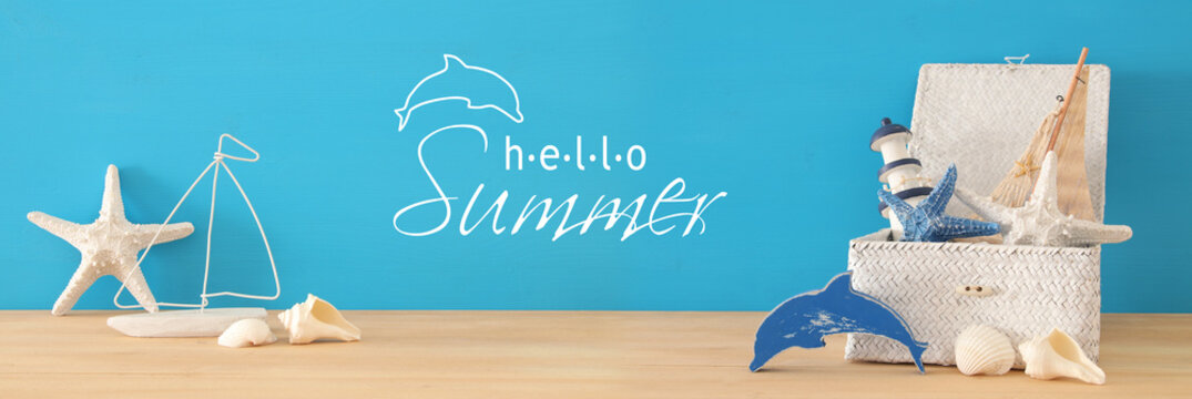 nautical, vacation and travel banner with sea life style objects over wooden table.