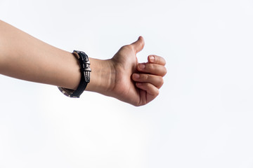 Women's hand To call the car. She put a black watch. And the thumbs up. White background.