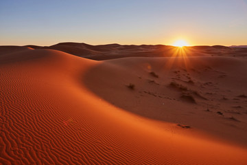 Beautiful sunset in the Sahara desert.