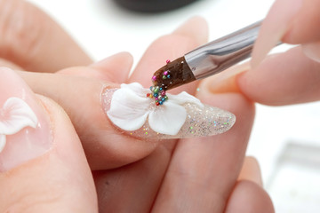 Amazing 3d Flower nail art design on tinted glass nails.
