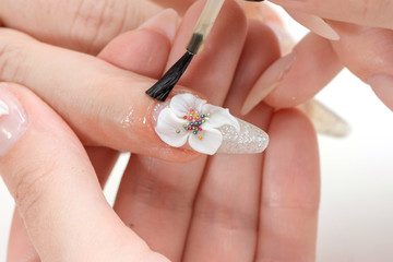 Amazing 3d Flower nail art design on tinted glass nails.