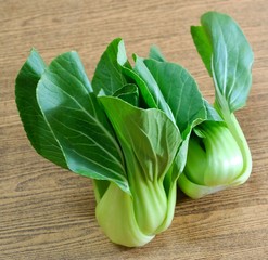 Fresh Green Bok Choy on A Table © arayabandit