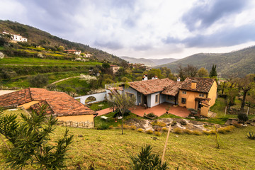 Fototapeta na wymiar Typical house in the Italian hills.