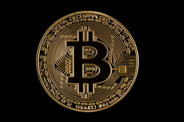 Golden Bitcoin on black background .Bitcoin is a major currency. of  cryptocurrency. .Include clipping path.