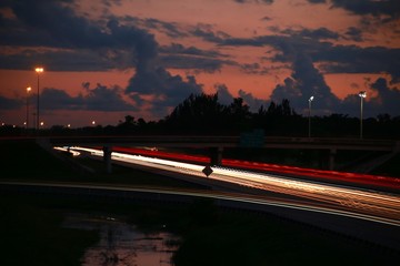 Time Exposure of Rush Hour Traffic on the Florida Turnpike at the Sample Road Overpass in Pompano Beach after Dusk