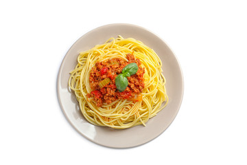 Plate with delicious pasta bolognese on white background, top view