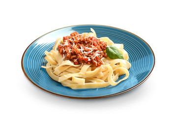 Plate with delicious pasta bolognese on white background