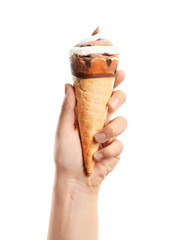 Woman holding yummy ice cream on white background. Focus on hand