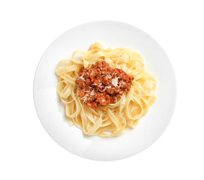 Plate with delicious pasta bolognese on white background, top view
