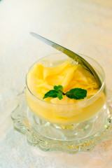Mango compote or Mango in syrup  is Thai dessert make by slide mango soak cool syrup with white background.Make fulfill in Thailand summer time.have some space for write wording