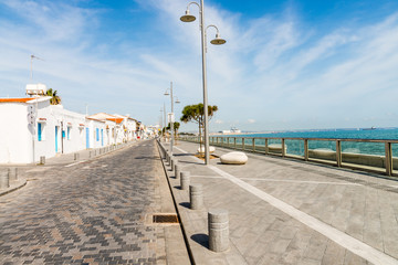 One-storied white houses on the embankment